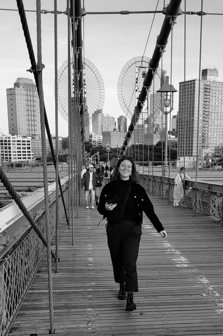 A black and white portrait of Sabrina Stallone